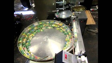 Loynds DTW Belt Feed Wrapper with Vibration Bowl Feeding. Greece.