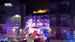 Large overnight apartment fire displaces dozens of people
