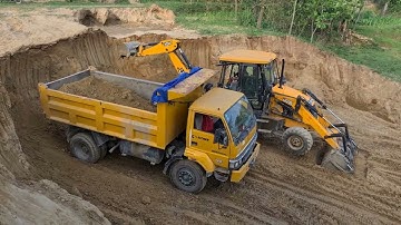 Jcb Backhoe machine loading soil in truck @roadtrendmachinework