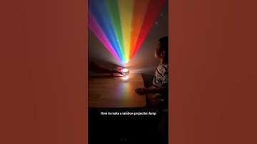 Use wide scotch tape and markers to make a rainbow projection lamp for your child! #parentchild