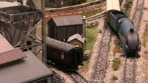 Mallard and a class 47 pulling rolling stock on 7 December 2022.