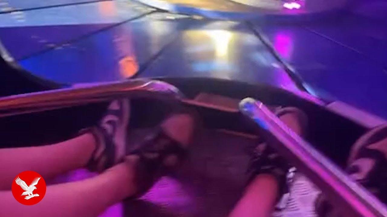 Terrifying moment car with children inside crashes off ride at fairground