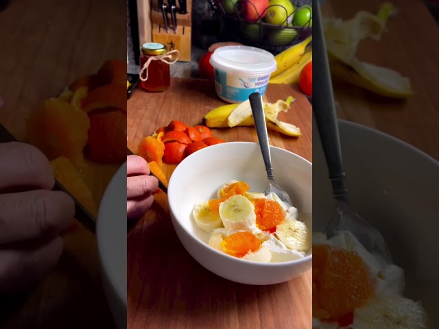 Yogurt Parfait With Mandarin Orange Banana Honey and Pistachios class=