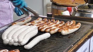 German Bratwurst Sausage Tasted in London Street. Borough Market