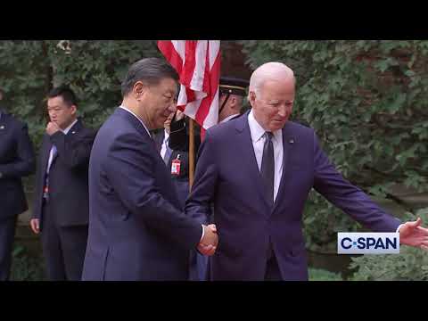 President Biden Shakes Hands With Chinese President Xi