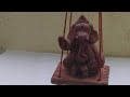 MAKING A GANPATI WITH A HANGER.