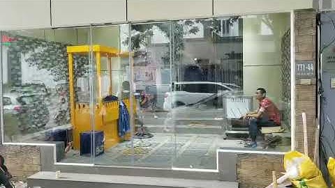 Cửa tự động TC-125B sử dụng nút bấm không dây