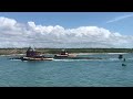 Submarine escorted into Port Canaveral.