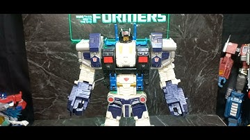 Transformation and review of Transformers Cybertron Leader Class Metroplex w/ Drill Bit