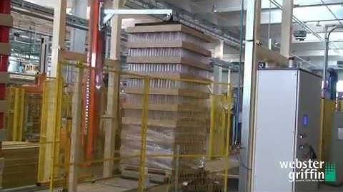 Rotary Arm Stretch Wrapper of Tall Unstable Load of Cans by Webster Griffin