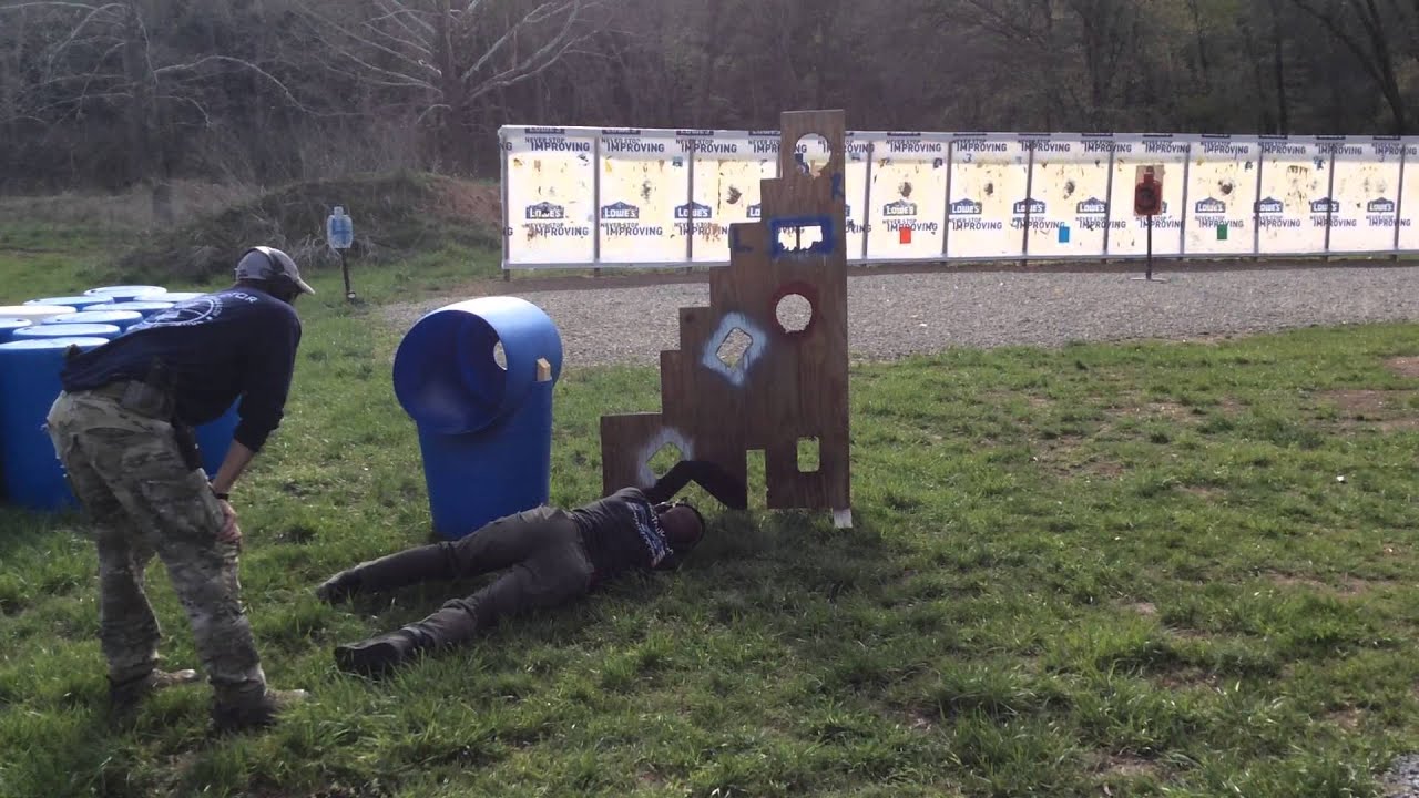 Instructor Marcos Avellan shooting pistol