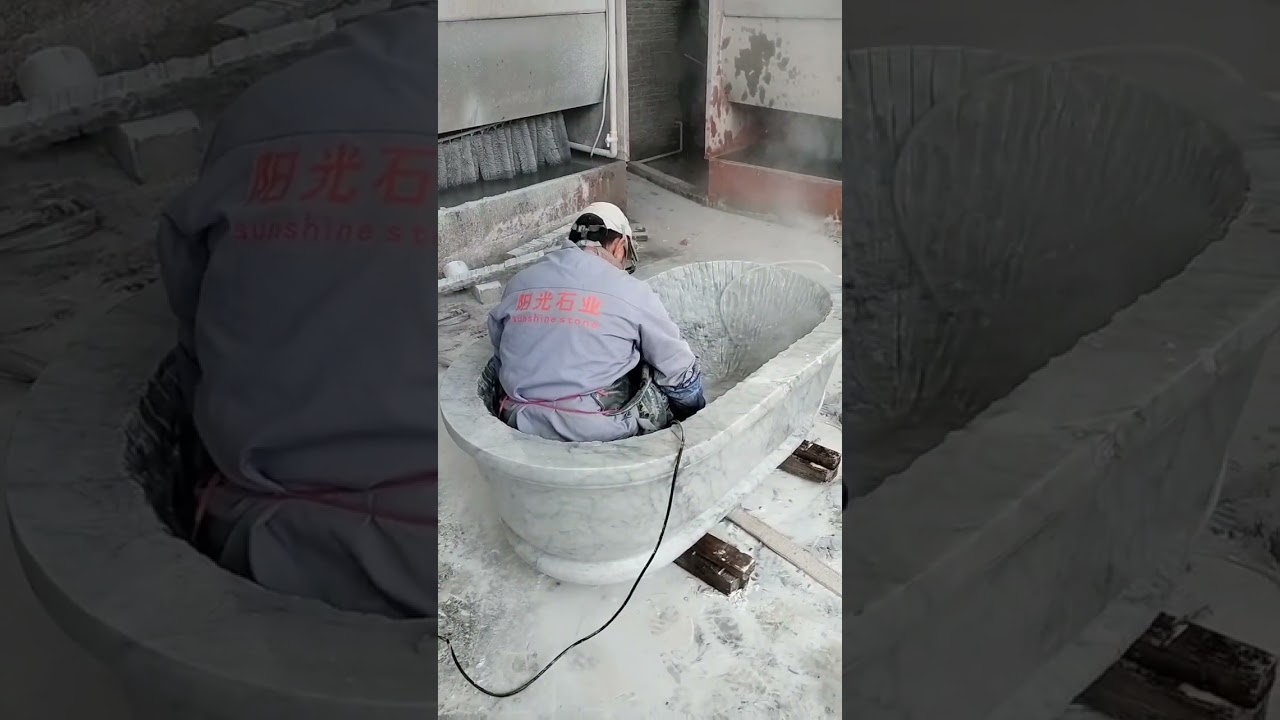 A luxury house marble bathtub  is cut from a Italy carrara marble block