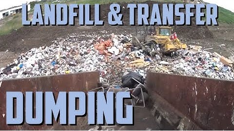 Garbage truck dumping in a landfill and a transfer station.