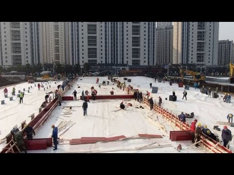 watch-workers-rush-to-build-china's-coronavirus-hospital