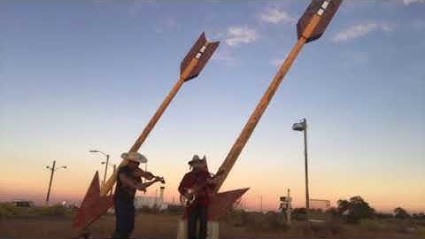 Tom Bennett and Rooster performing Show Me The Exit Sign at Twin Arrows Trading Post