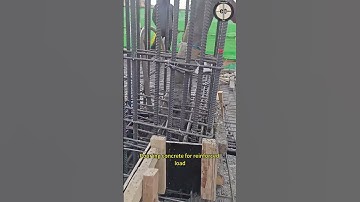 Pouring concrete for reinforced load-bearing columns at the construction site