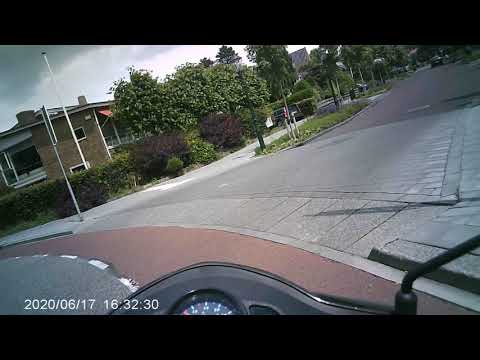 Met de brommer door Weesp
