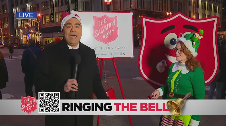 Albert Ramon and Tina Evans ringing the bell for t...