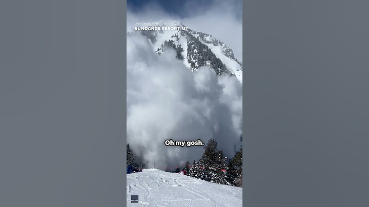 Video captures massive avalanche covering skiers in snow cloud #Shorts