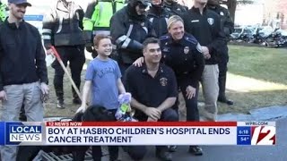 Boy gets police escort after finishing cancer treatment