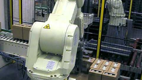 RFA Kawasaki Robotpalletiser for wrap around boxes with 1L. milk cartons