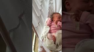 Newborn baby waking up