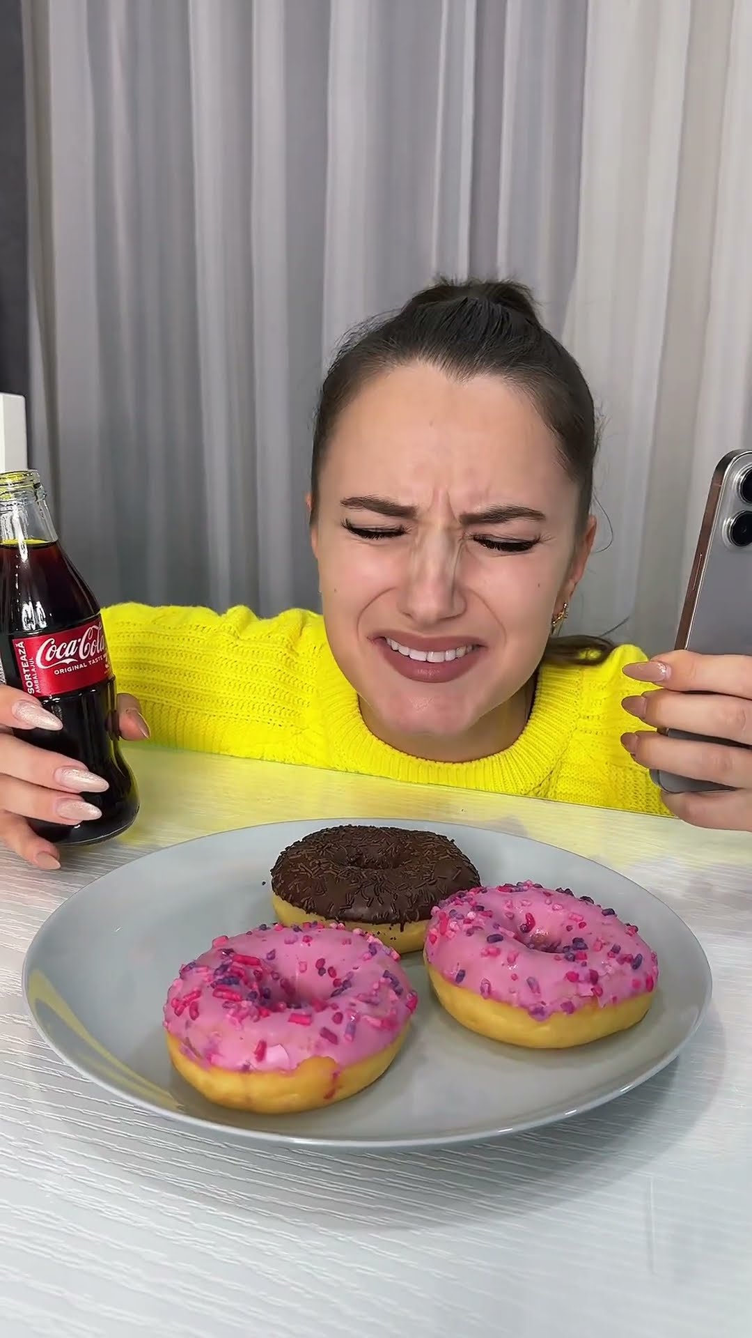 Only two hands for Donut Coca-Cola and IPhone