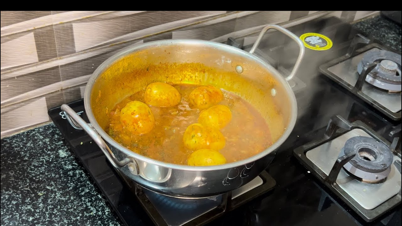 Tomato egg gravy curry boiled egg egg gravy curry in Priya’s