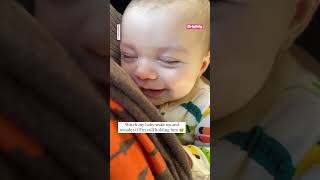 Baby has priceless smile upon waking up and realizing he's still in mom's arms | GMA