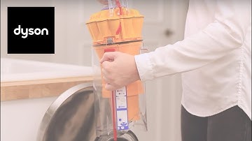 How to empty and clean the clear bin on your Dyson Lightball™ upright vacuum