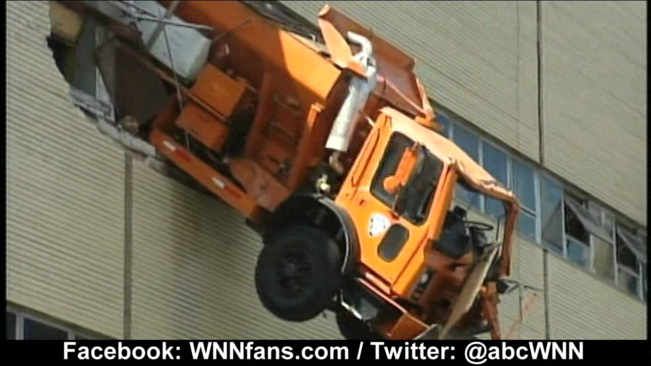Truck Dangles From New York City Building