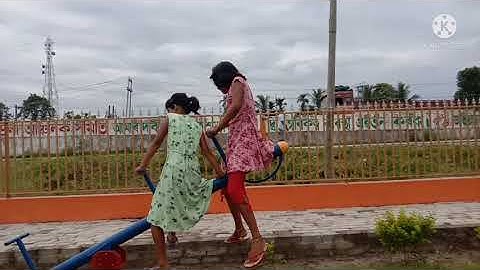 playground for  kids with  seesaw , swing and slides at the park.