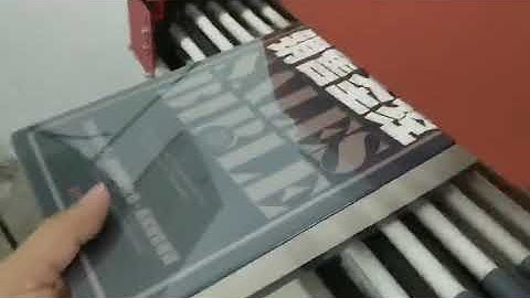 Automatic heat shrink packaging machine for book,  automatic stationery heat shrink packing machine