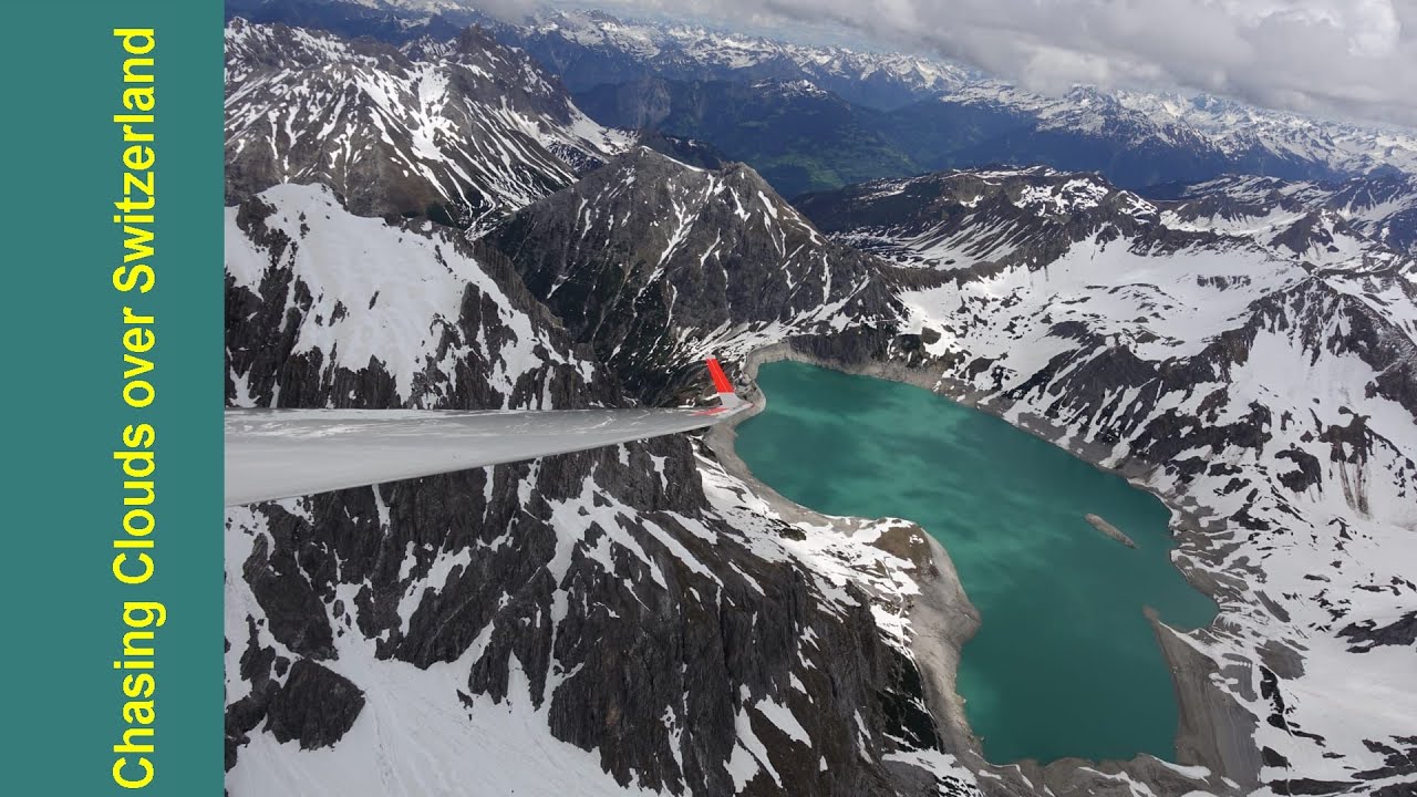 Swiss Alps Gliding: Chasing Clouds over Switzerland