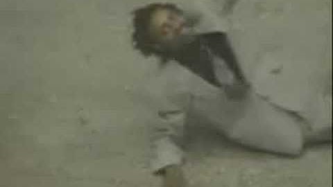 Dude Slides Down Escalator Rail