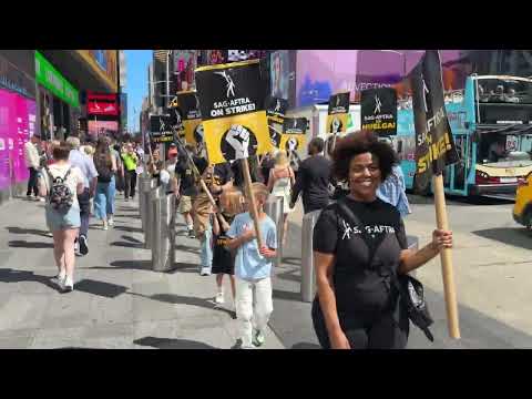 SAG-AFTRA WGA workers on strike picket line protest Paramount MTV Times Square NYC August 31st 2023