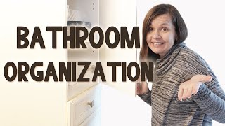 Bathroom Organizing Idea With Clear Containers |  His \& Hers vanity cupboards |  Replacing baskets