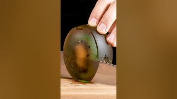 Relax and enjoy this AI-generated ASMR video of cutting a glass lemon 🍋 #ASMR #AI #Satisfying #Relax