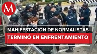 Normalistas se enfrentan con policías en Tuxtla Gutiérrez