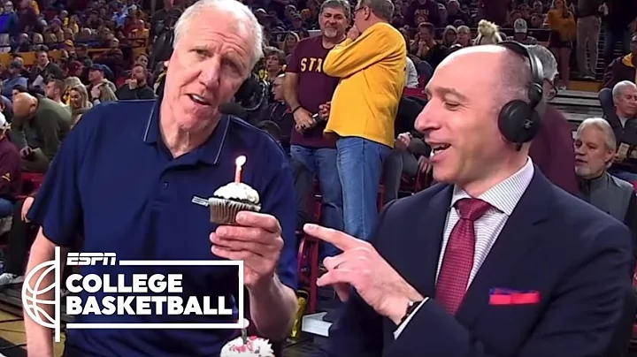 Bill Walton eats a cupcake with a lit candle, teas...