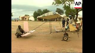 Mavivye Village (110km East of Nairobi), Kenya - June 2005 1. Steven Kilonzo driving his homemade plane through the village 2.