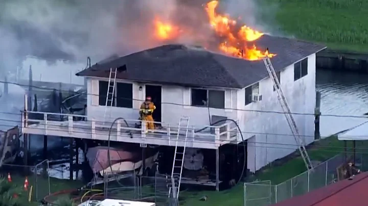 LIVE: Firefighters battling flames at waterfront h...