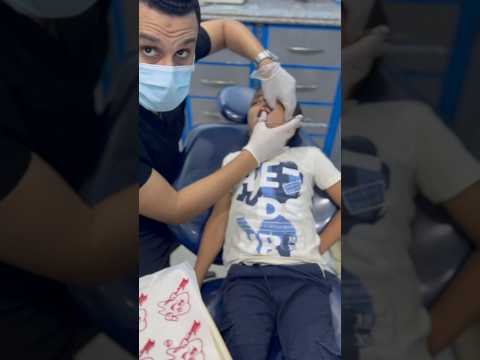 شجاعة طفل في عيادة الأسنان حقنة بنج الأسنان      اسنان اكسبلور