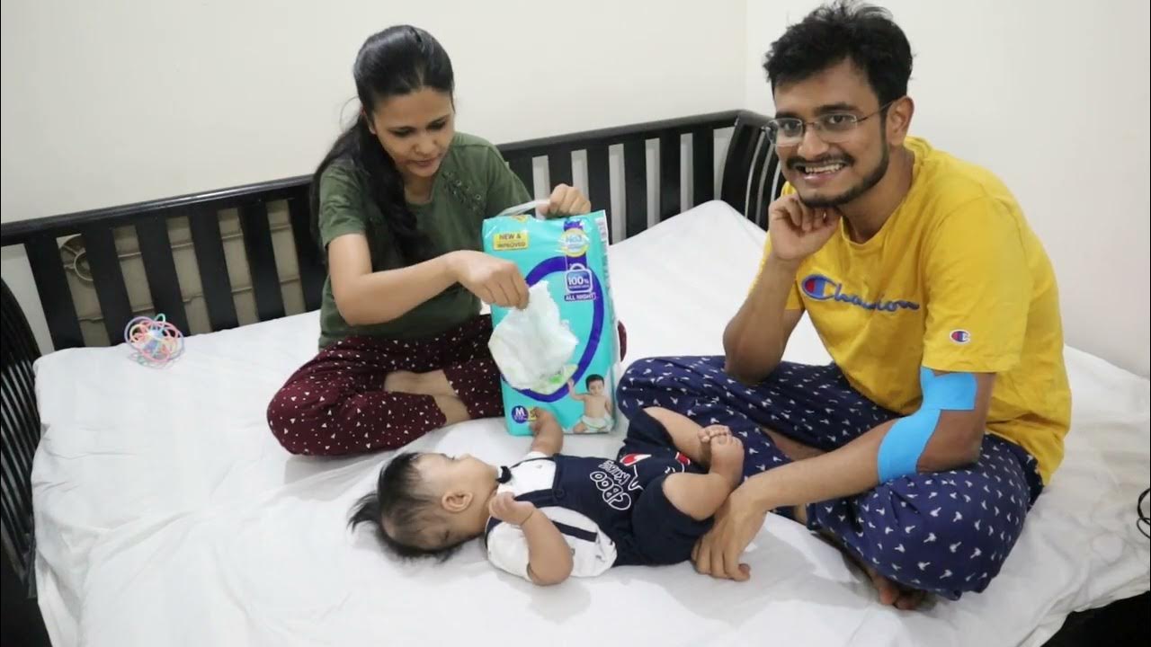 mom and dad changing diaper of 4 months old baby Diaper changing song