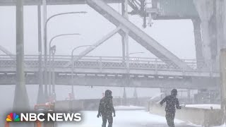 Powerful storm slams Midwest with heavy rain and snow