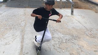 Skater Kid Trys Scooter