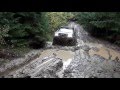 Mitsubishi L200 in deep mud. Off Road 4x4 in Ukrainian Carpathian