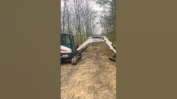 Fixing driveway and ditching, bobcat e32