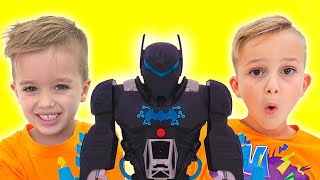 Vlad e Niki brincam com o brinquedo infantil Bat-Tech BatBot e salvam a cidade