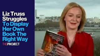 Liz Truss Struggles To Display Her Own Book The Right Way